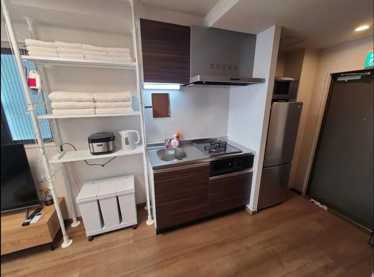 Apartamento 上野駅徒歩５分シングルベッド４台＋布団２セット1Ldk Tokio Exterior foto